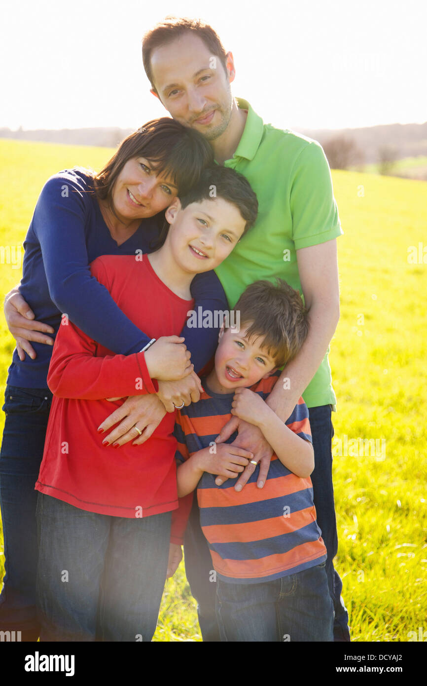 Arms around family hi-res stock photography and images - Alamy