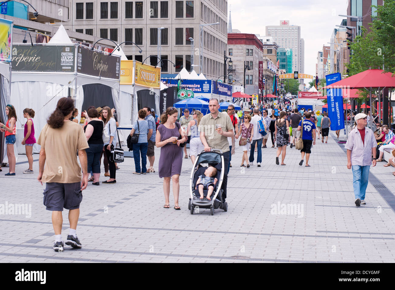Pedestrians on a part Ste Catherine street which is closed to ...