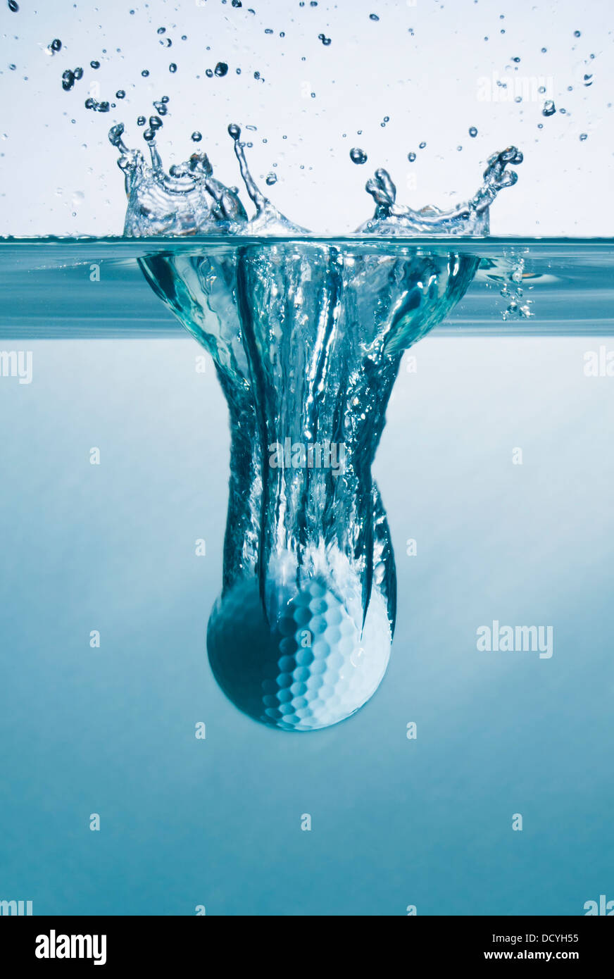 Golf Ball Splashing Into Water Stock Photo Alamy