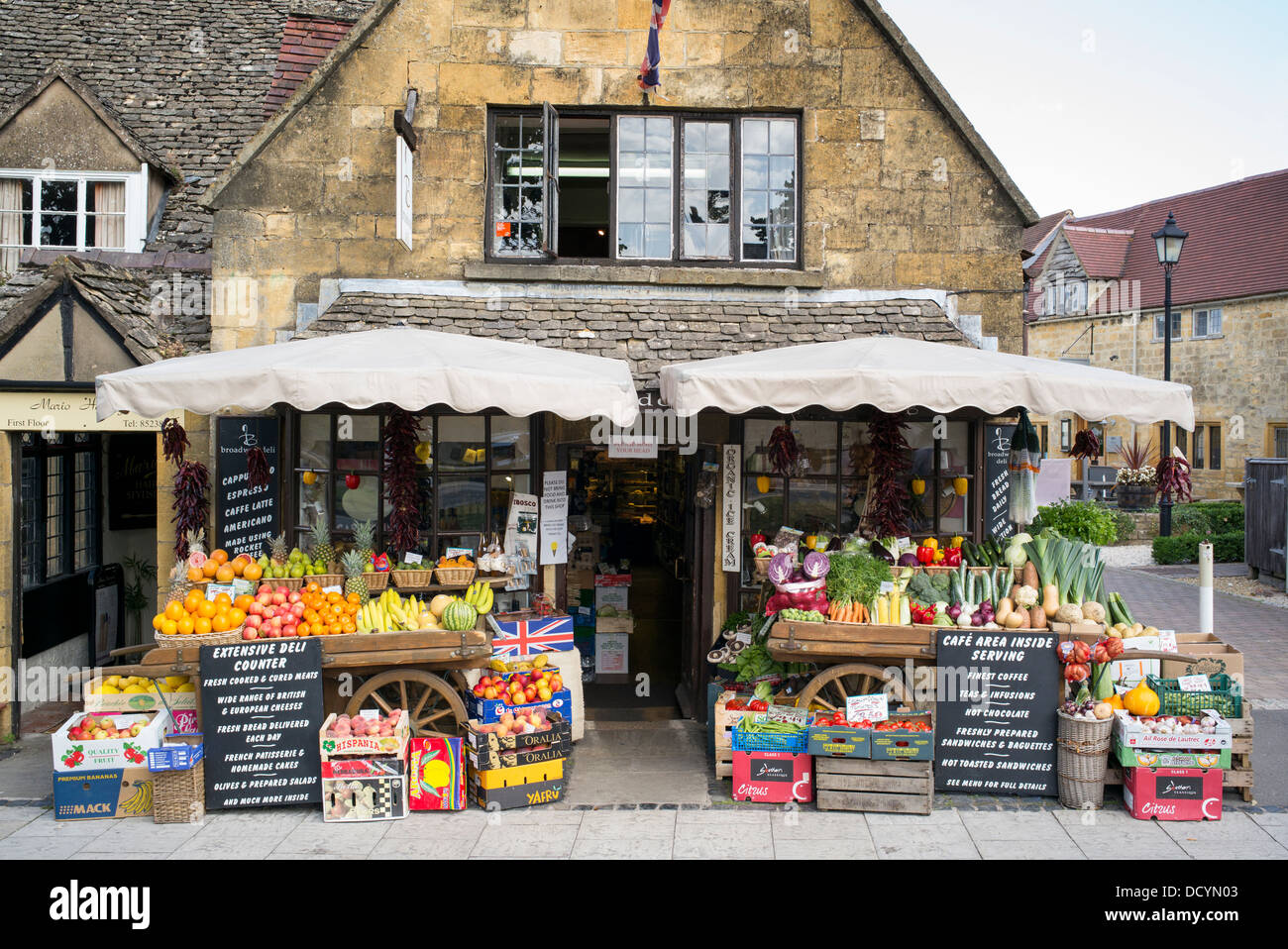 Fruit and Vegetable carts outside the Deli shop, Broadway, Cotswolds