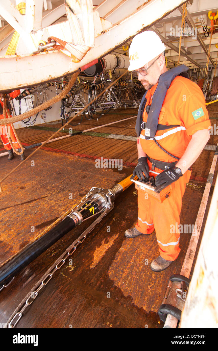 Gun Mechanics working on Seismic Air guns at Gun Deck in the seismic