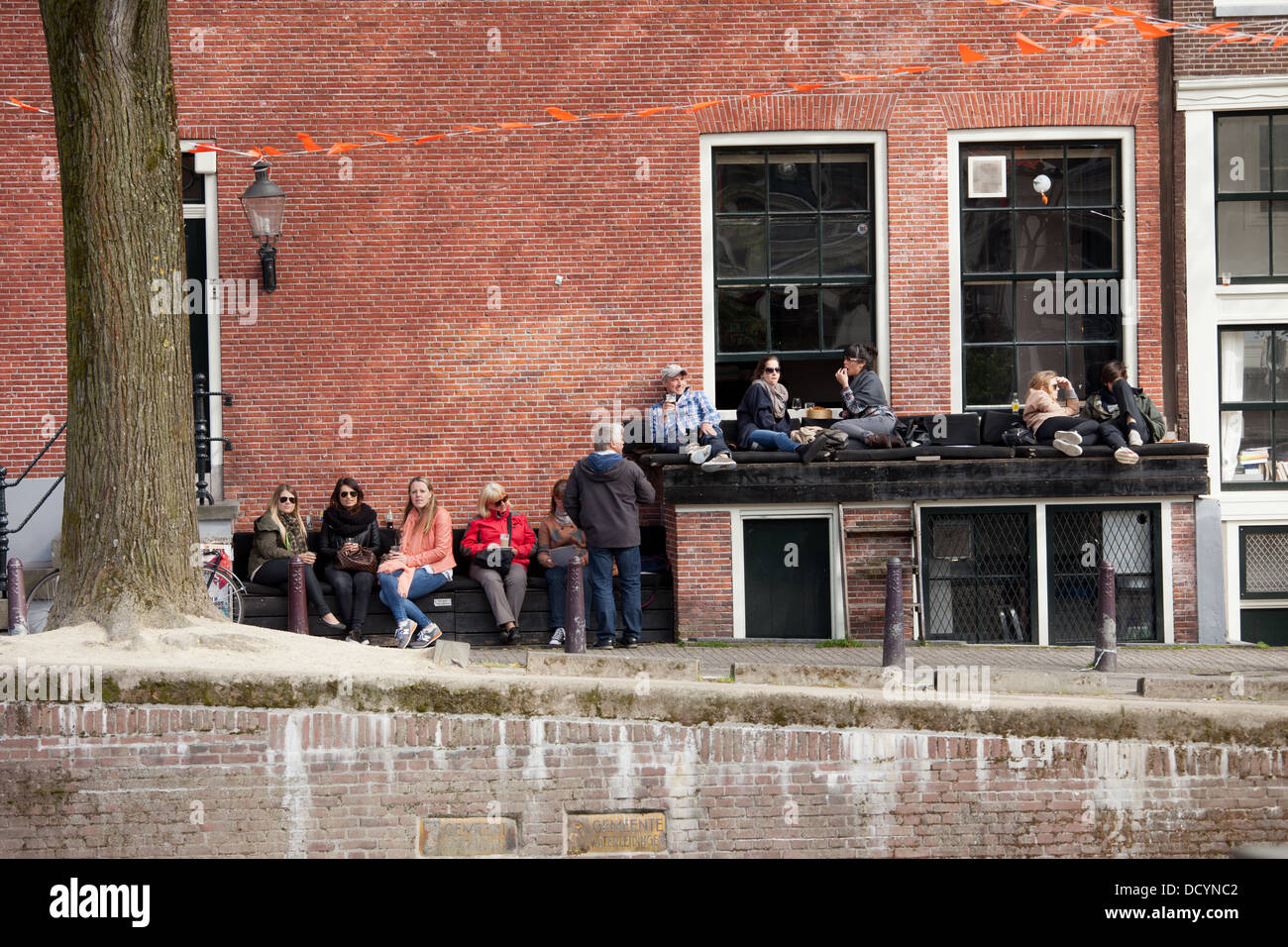 Amsterdam, people sit and relax at outdoor cafe, Holland, Netherlands