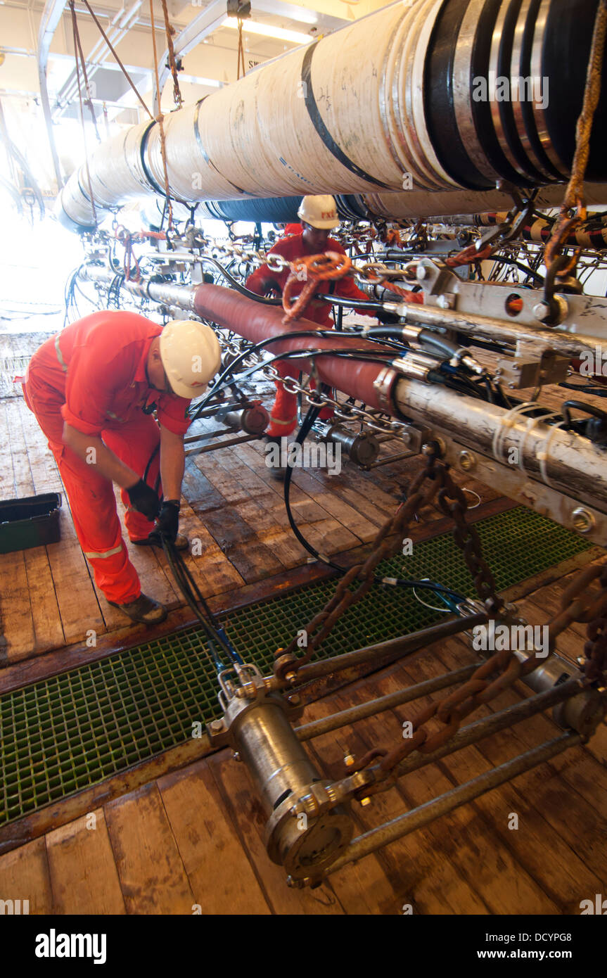 Gun Mechanics working on Seismic Air guns at Gun Deck in the seismic