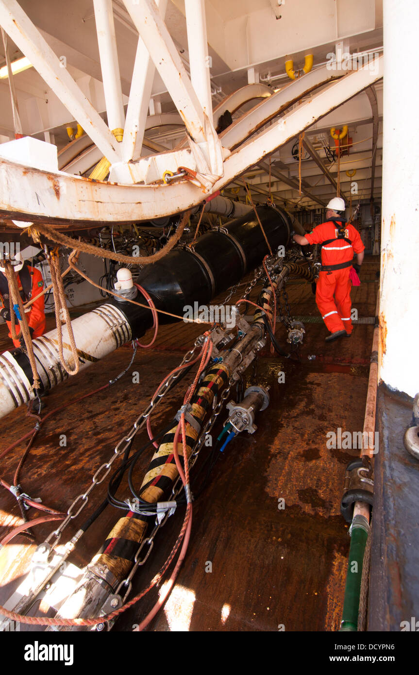 Gun Mechanics working on Seismic Air guns at Gun Deck in the seismic