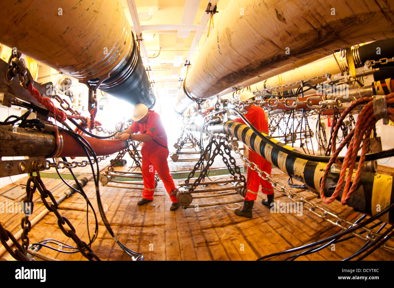 Gun Mechanics working on Seismic Air guns at Gun Deck in the seismic