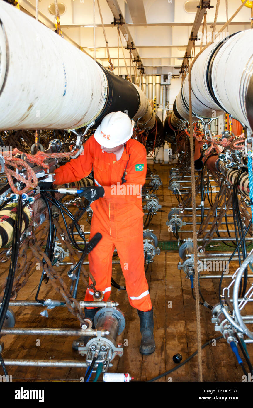 Gun Mechanics working on Seismic Air guns at Gun Deck in the seismic
