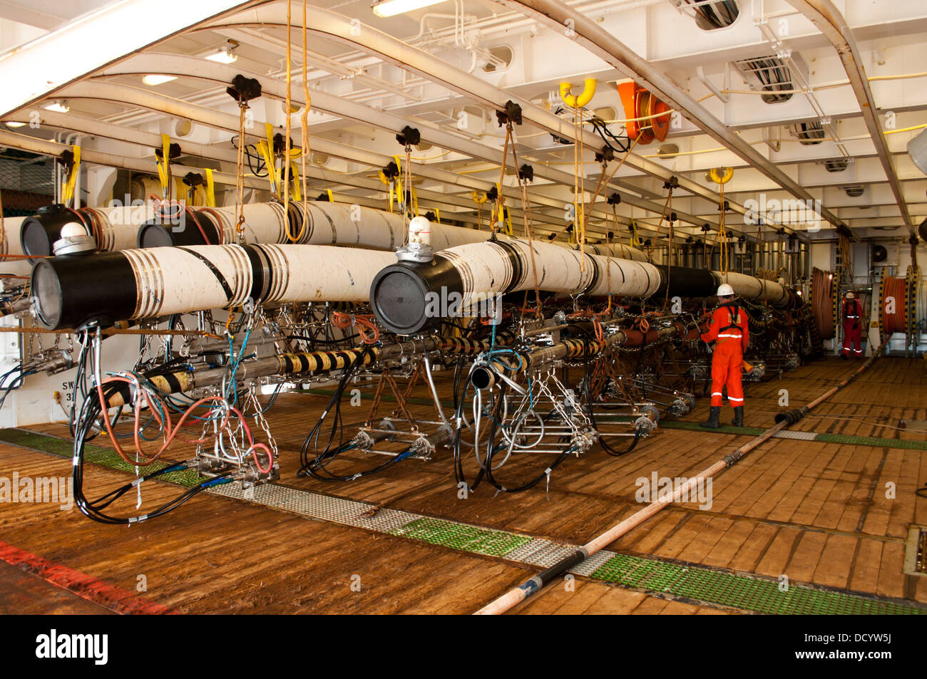 Gun Mechanics working on Seismic Air guns at Gun Deck in the seismic