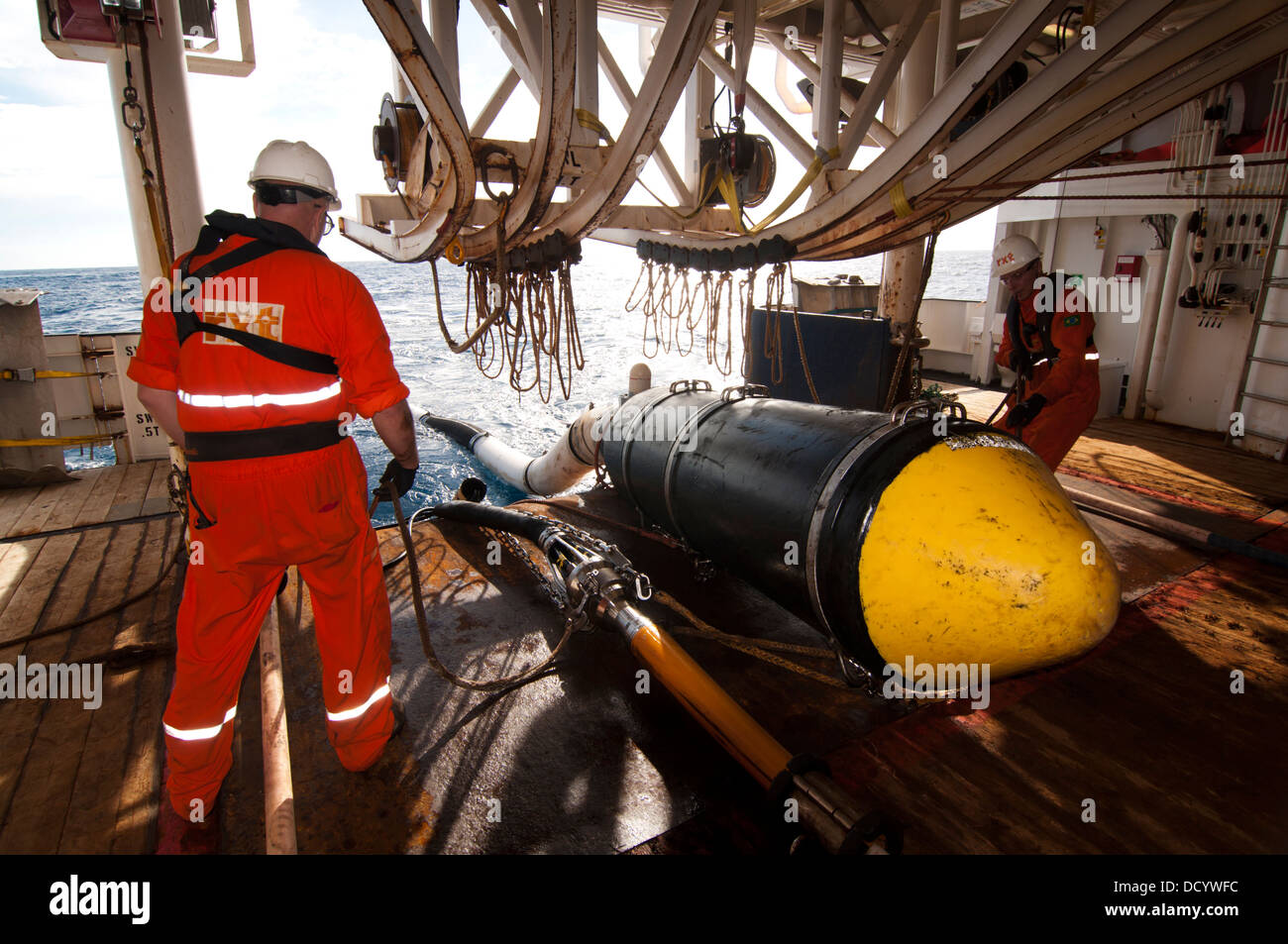 Gun Mechanics working on Seismic Air guns at Gun Deck in the seismic