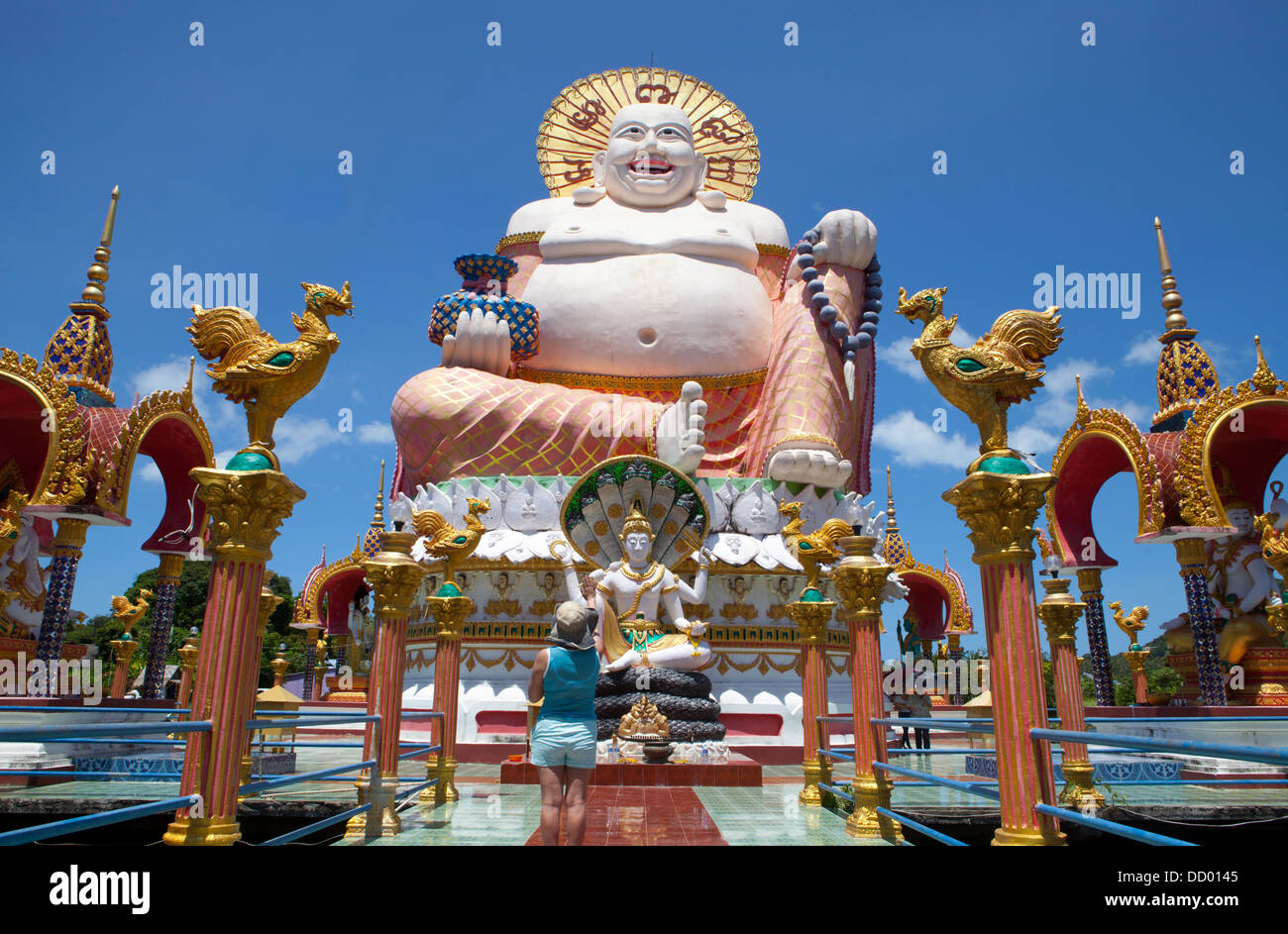 A buddha statue at Wat Plai Laem on Ko Samui Island in the Gulf of Thailand. Stock Photo