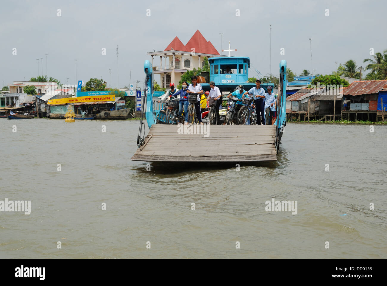 A ferry crossing the Mekong River near Vinh Long, Mekong Delta, Vietnam ...