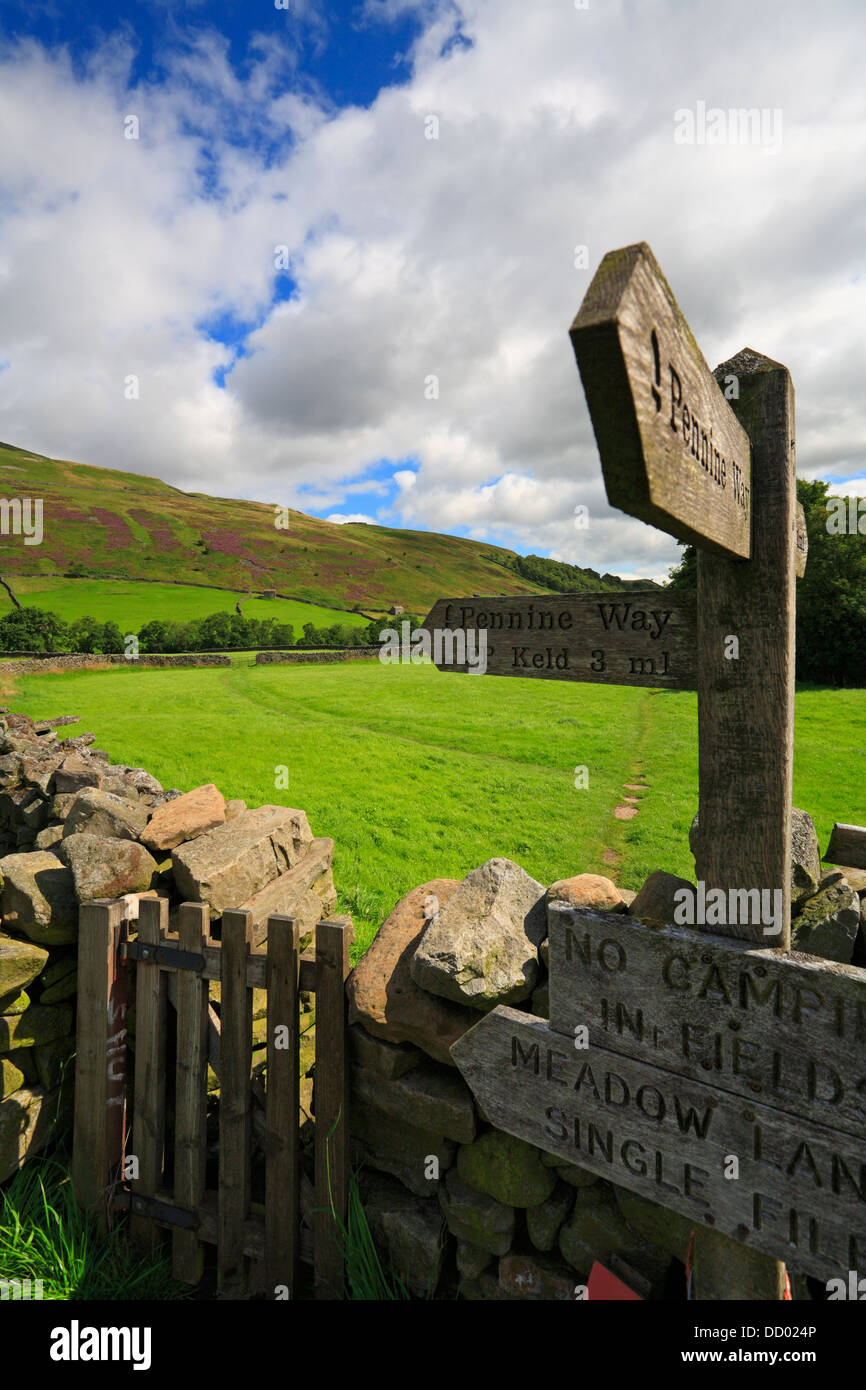 The Pennine Way marker post near Thwaite, Swaledale, North Yorkshire, Yorkshire Dales National Park, England, UK. Stock Photo