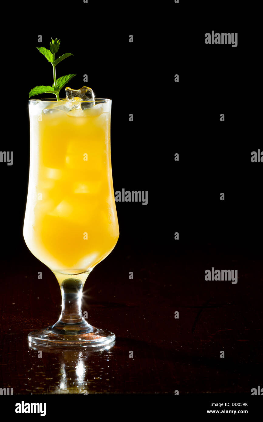 screwdriver, fresh orange juice with vodka served in a stem glass on a dark bar Stock Photo Alamy