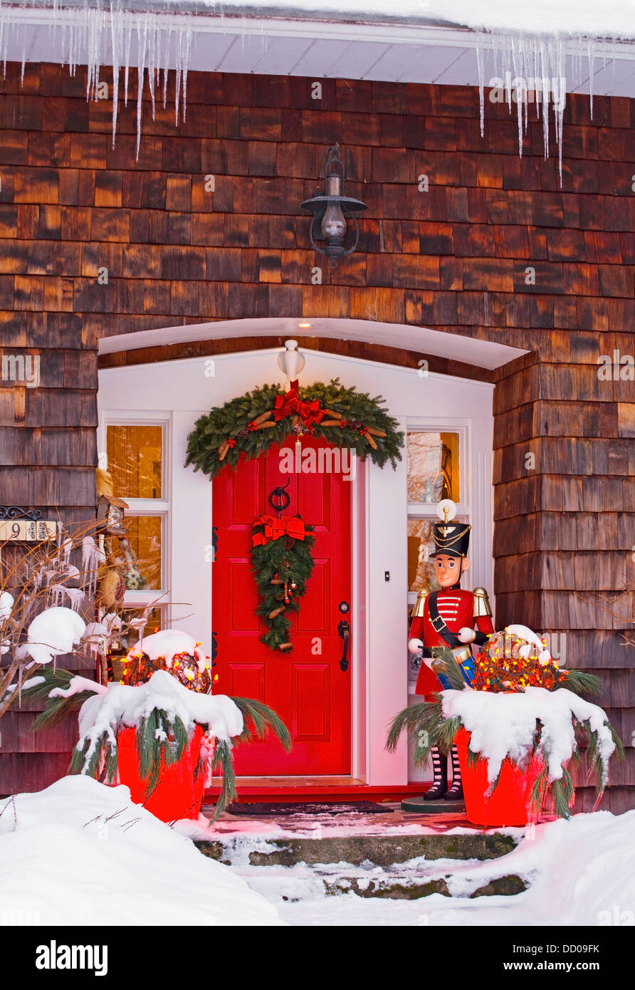 Christmas Decorations Around A Front Door; Knowlton, Quebec, Canada Stock Photo