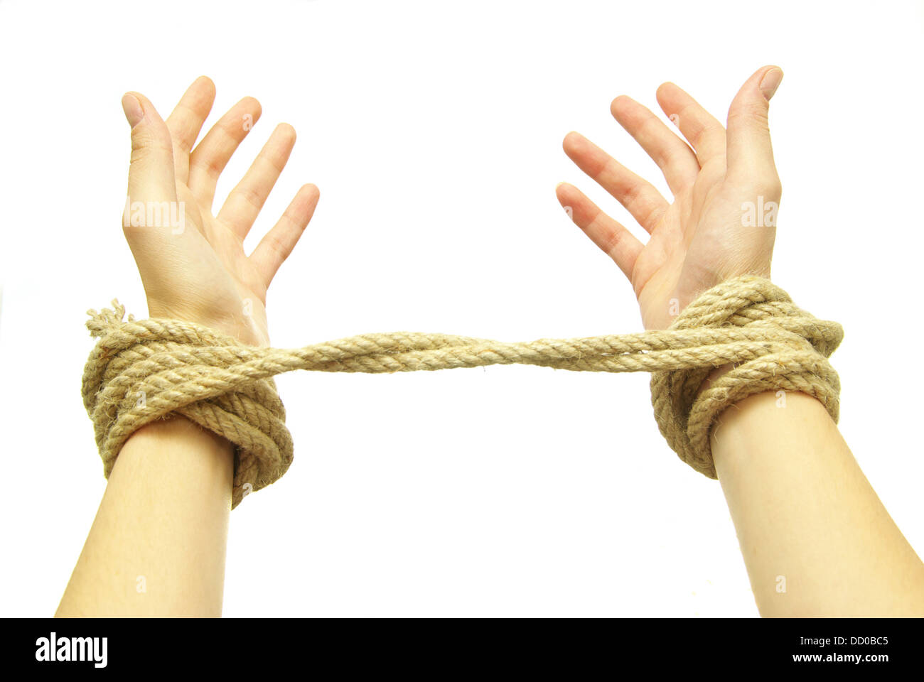 hands in rope Stock Photo