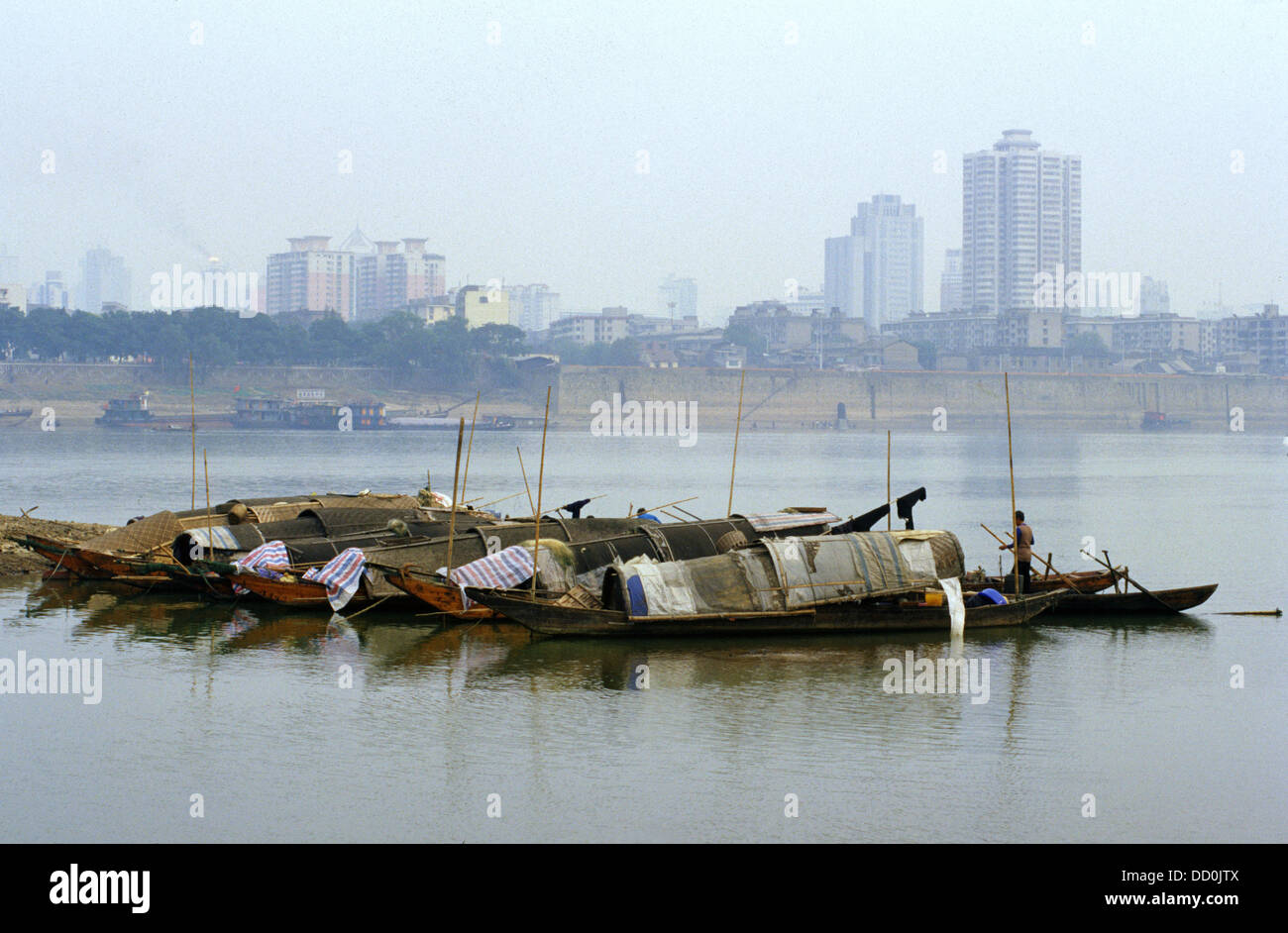 Sampan boats moored in Xiang river  in the city of Changsha in Hunan province China Stock Photo