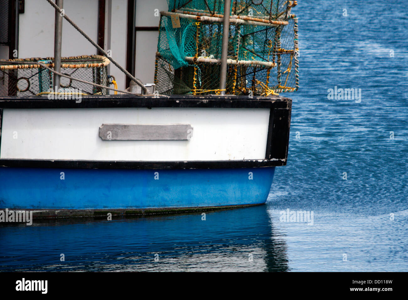 A White Blue Fishing Boat Stock Photo - Alamy