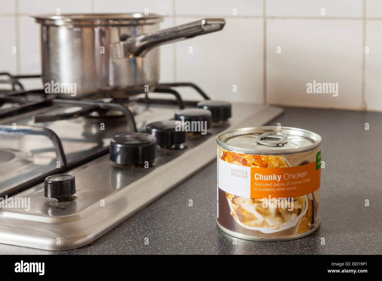 Own brand canned food. Marks & Spencer Chunky Chicken pieces in a can. Stock Photo
