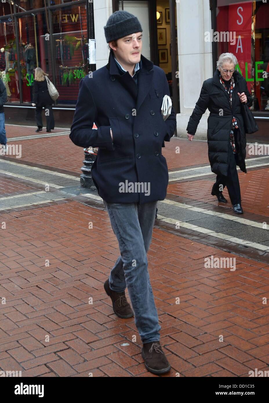 British actor Sam Riley (Control) seen walking down Grafton Street with a newspaper under his arm. He is currently in Ireland filming 'Byzantium' with Saoirse Ronan & Gemma Arterton, Dublin, Ireland - 24.01.12. Stock Photo