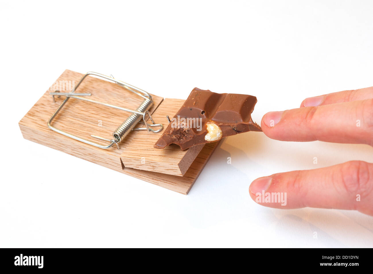 A mousetrap set with chocolate bait Stock Photo Alamy