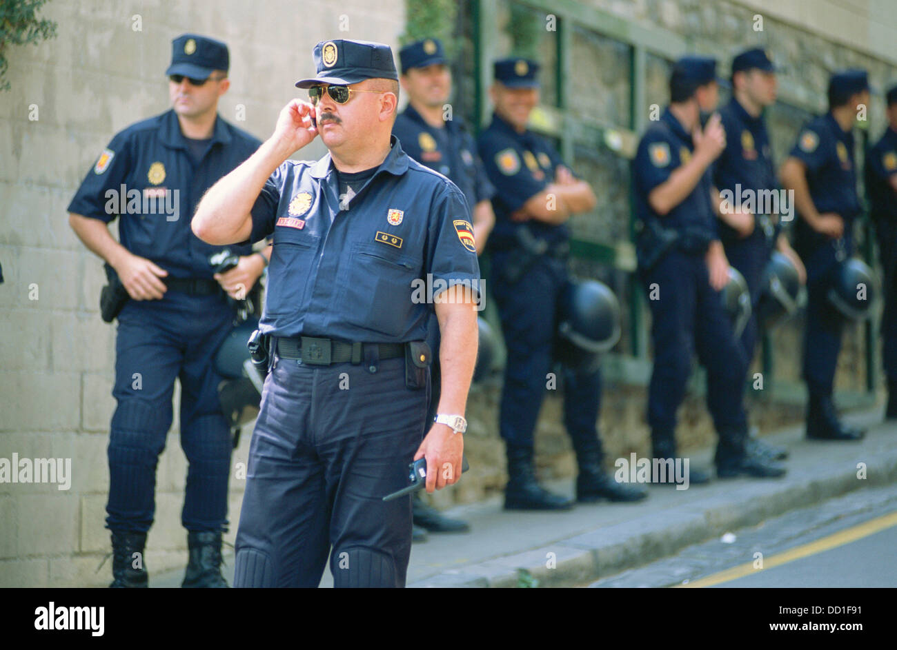Police in demonstration by animal rights activist during San Fermin festival. Pamplona. Navarra, Spain Stock Photo