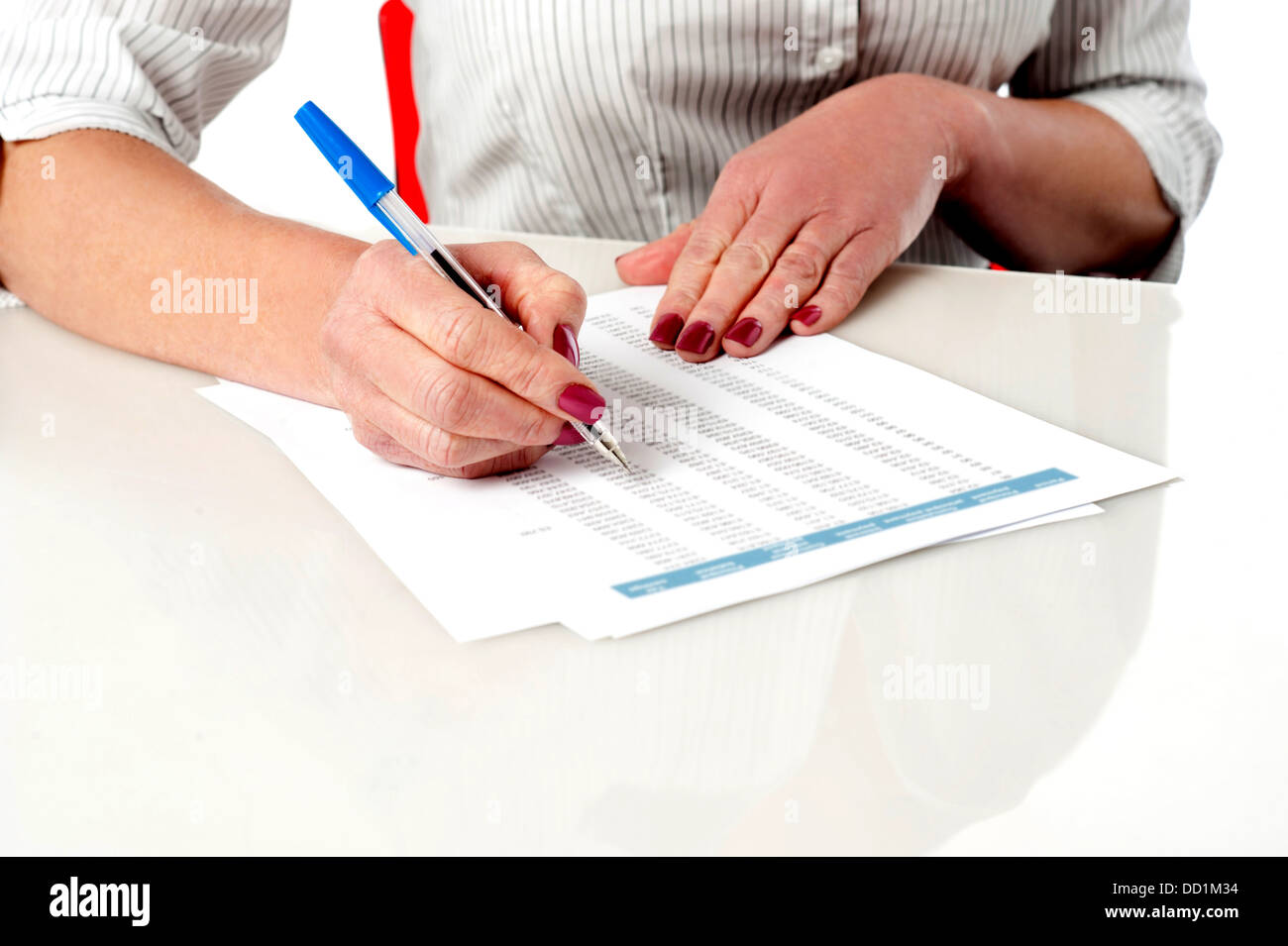 Cropped image of a lady verifying employee records. Stock Photo