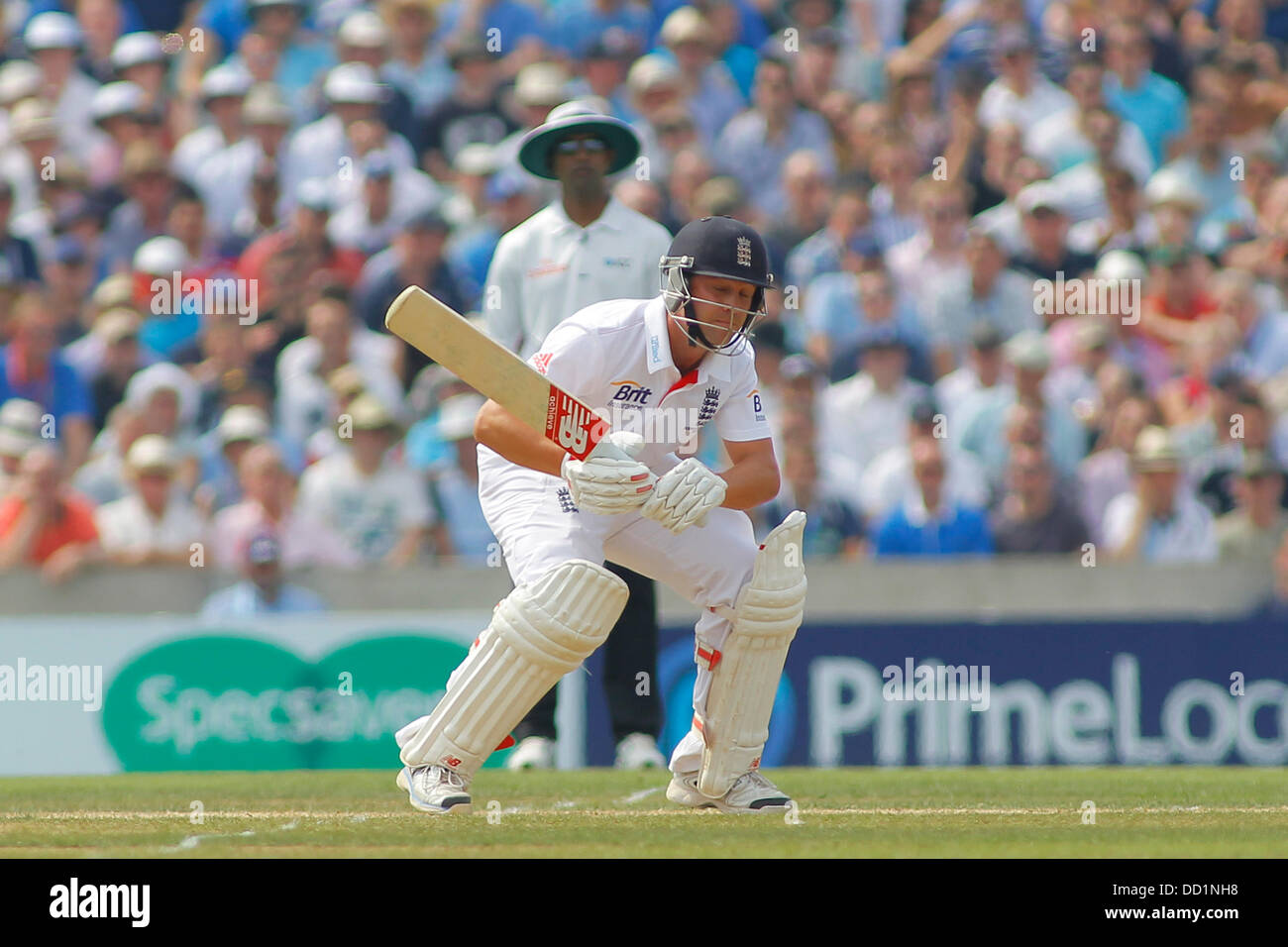 London, UK. 23rd Aug, 2013. Jonathan Trott ducks under a bouncer during day three of the 5th Investec Ashes cricket match between England and Australia played at The Kia Oval Cricket Ground on August 23, 2013 in London, England. Credit:  Mitchell Gunn/ESPA/Alamy Live News Stock Photo