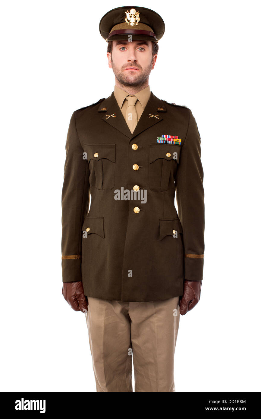 Smart young army officer standing in attention position Stock Photo Alamy