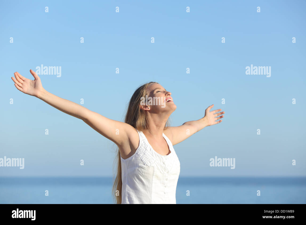 Raising arms to the sky hi-res stock photography and images - Alamy
