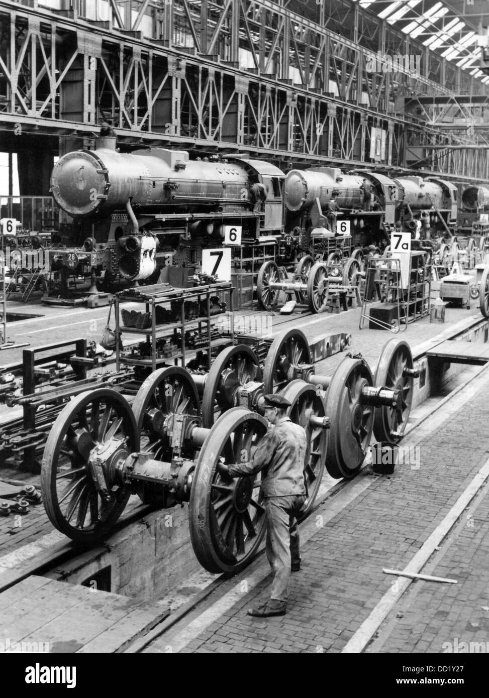 View of the production of a war locomotive series 52 at the Berliner Maschinenbau AG in Wildau, Germany, in August 1943. The construction of a locomotive well-suited for the employment in war should ensure adequate supplying of the territories in the East occupied by the German Wehrmacht. Photo: Bildarchiv der Eisenbahnstiftung/RVM (minimum fee 60 euros) Stock Photo