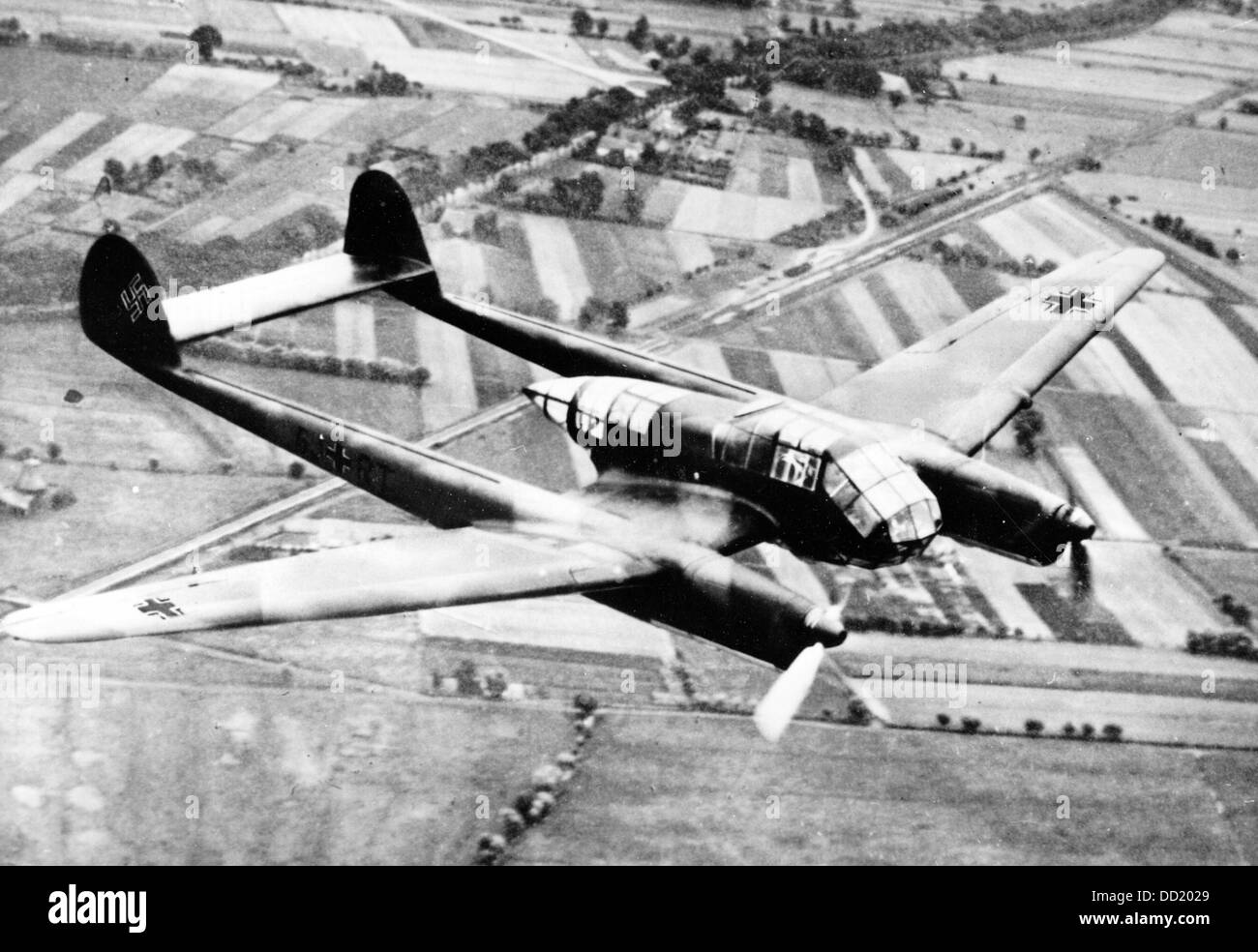 The close reconnaissance aircraft Focke-Wulf Fw 189 ('Uhu' - 'Eagle Owl') in flight in March 1941. Place unknown. The Nazi Propaganda! on the back of the picture is dated 31 March 1941: 'Focke-Wulf Fw 189 - the most modern close reconnaissance aircraft of the world! The first twin-boom aircraft of the German Luftwaffe, which was developed on the basis of the most recent progress in the knowledge about flight technology, is a fundamental part of the German air superiority. The important reconnaissance activity of the Luftwaffe, which ensures the leadership of the Wehrmacht, got an important wea Stock Photo