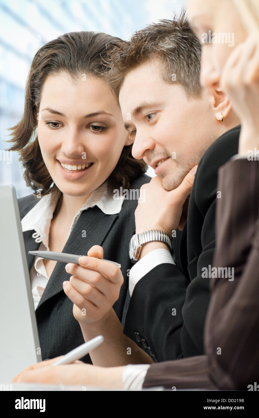team of successful smiling young business people Stock Photo - Alamy