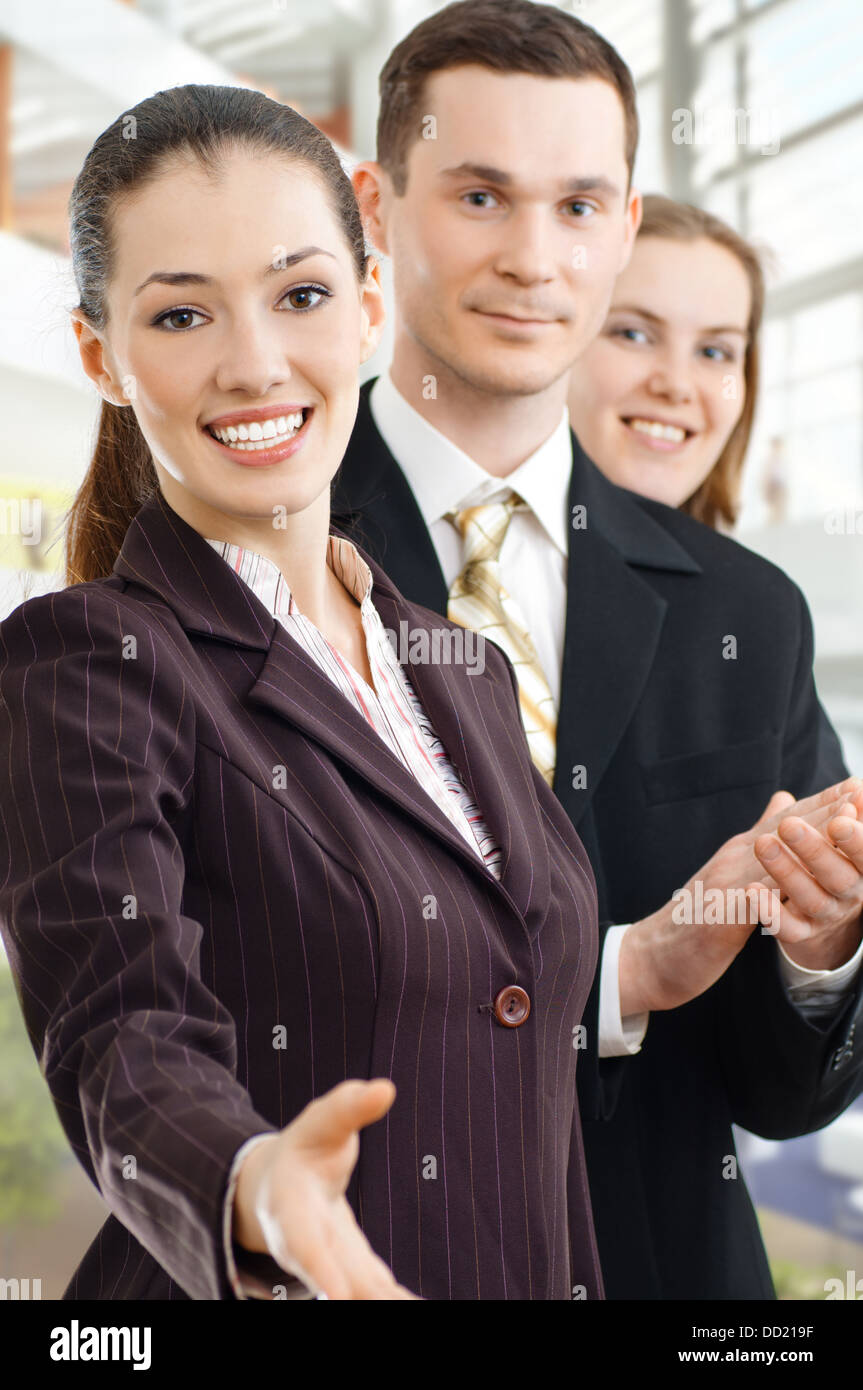 team of successful smiling young business people Stock Photo - Alamy
