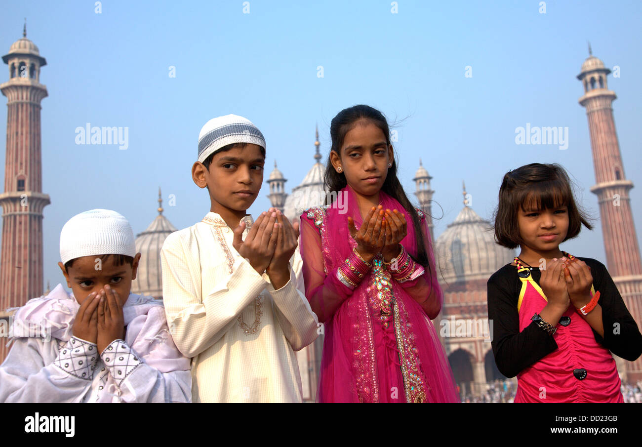 Adult child praying together hi-res stock photography and images - Alamy