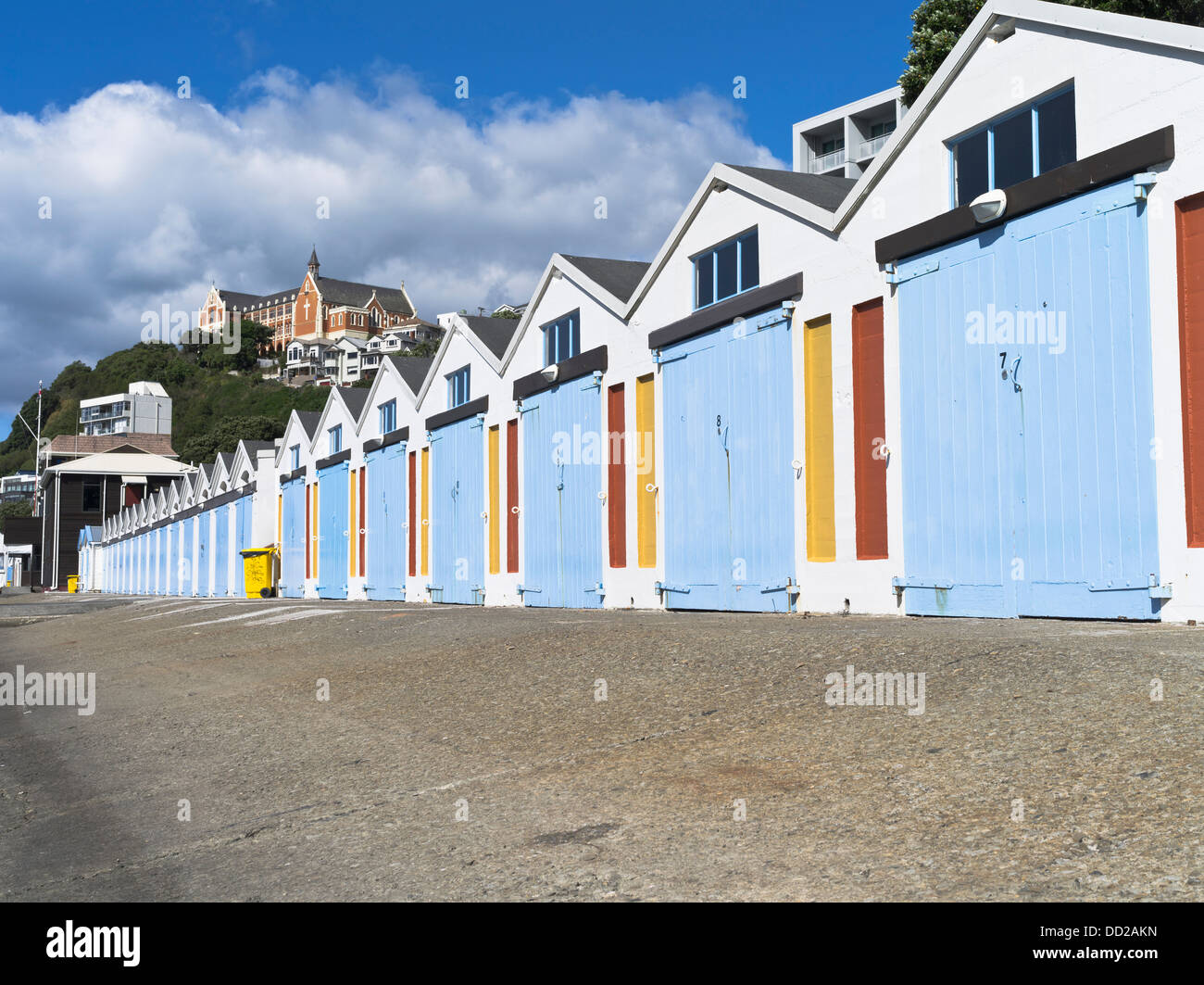 dh Lambton Harbour WELLINGTON NEW ZEALAND Colourful boatshed doors Clyde Quay Marina St Gerards Monastery Stock Photo