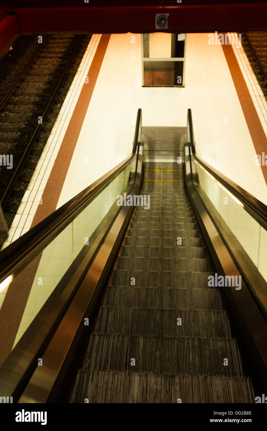Moving staircase at an airport Stock Photo