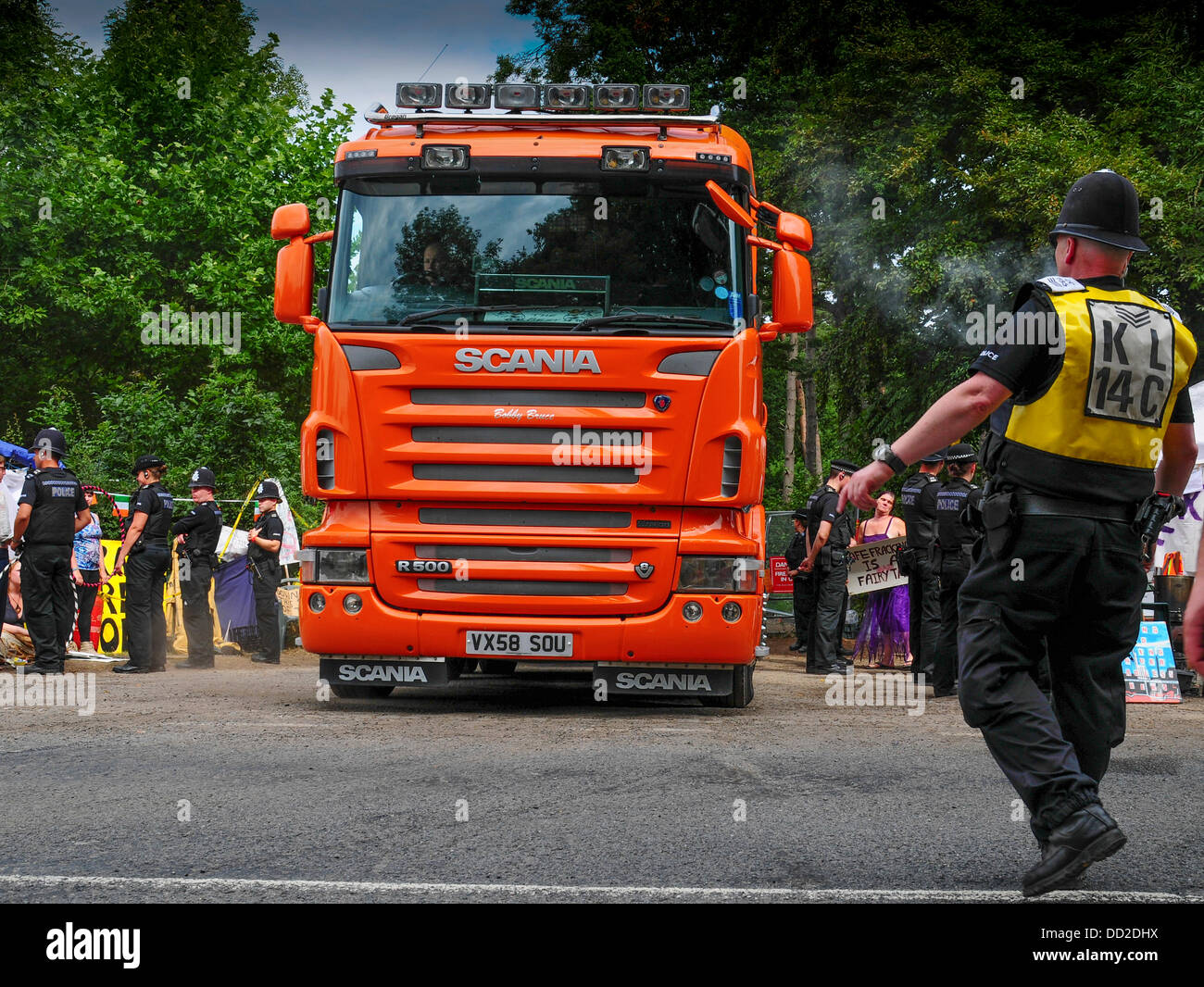 Balcombe, Sussex, UK. 23rd Aug, 2013. Lorry leaving the Cuadrilla test drilling site entrance. Police keep protestors at bay. Credit:  David Burr/Alamy Live News Stock Photo