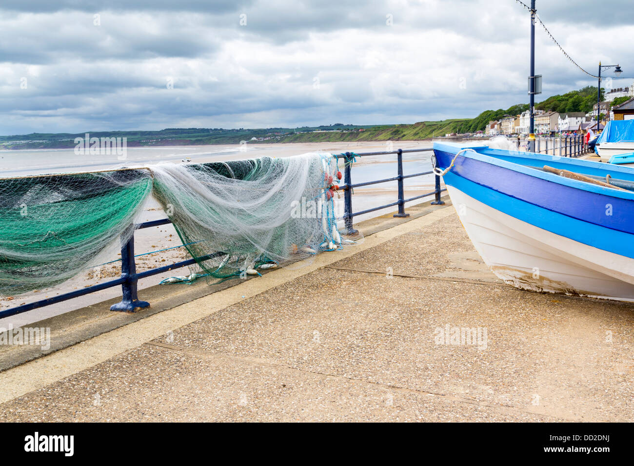 Fishing boat and nets at Filey Yorkshire England UK Stock Photo