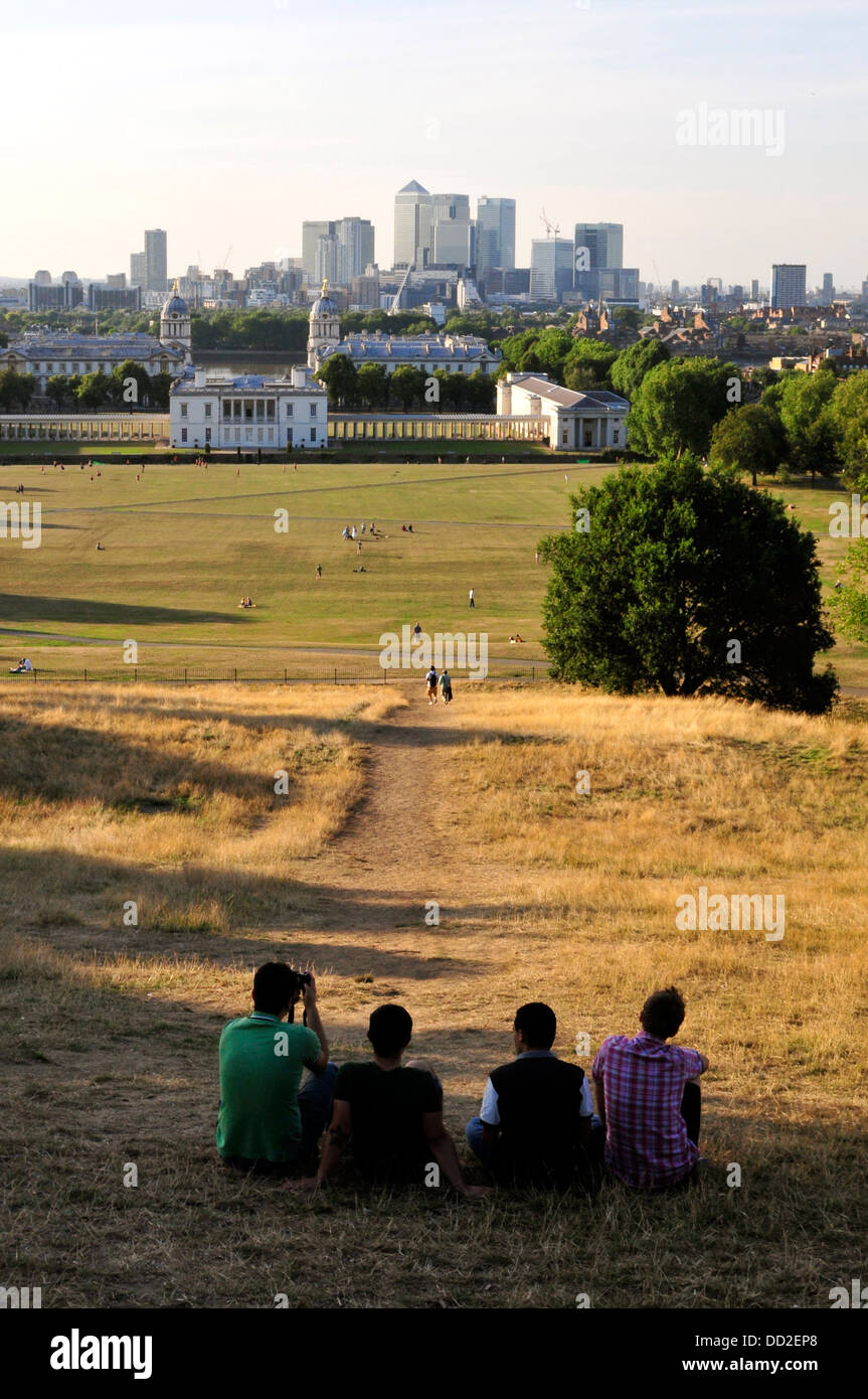 A group of young people relax in Greenwich Park, London, UK. Stock Photo