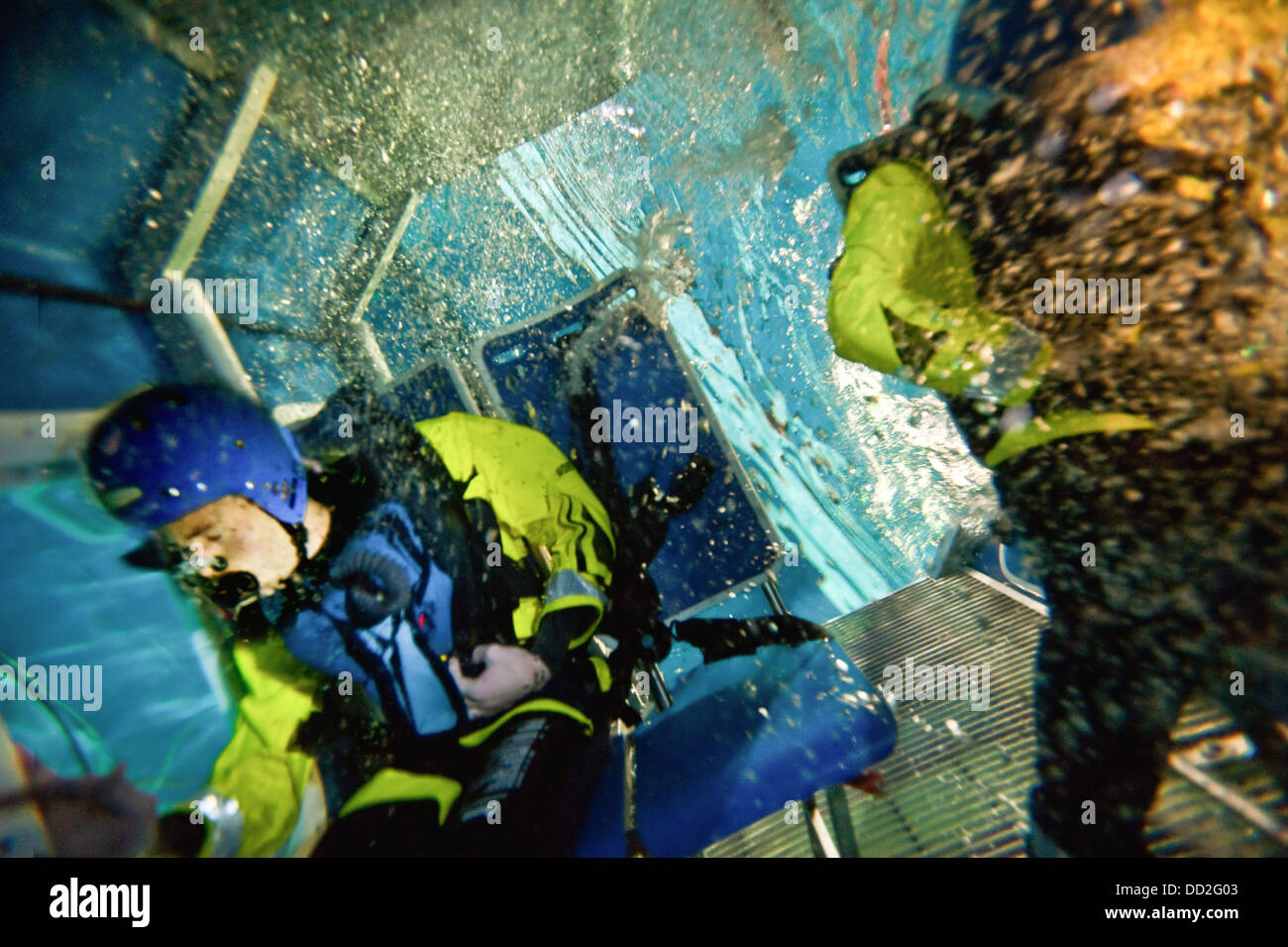 North Sea Oil offshore crew change helicopter underwater ditching and  escape training in Aberdeen. Super Puma,EC225,S90 Stock Photo - Alamy