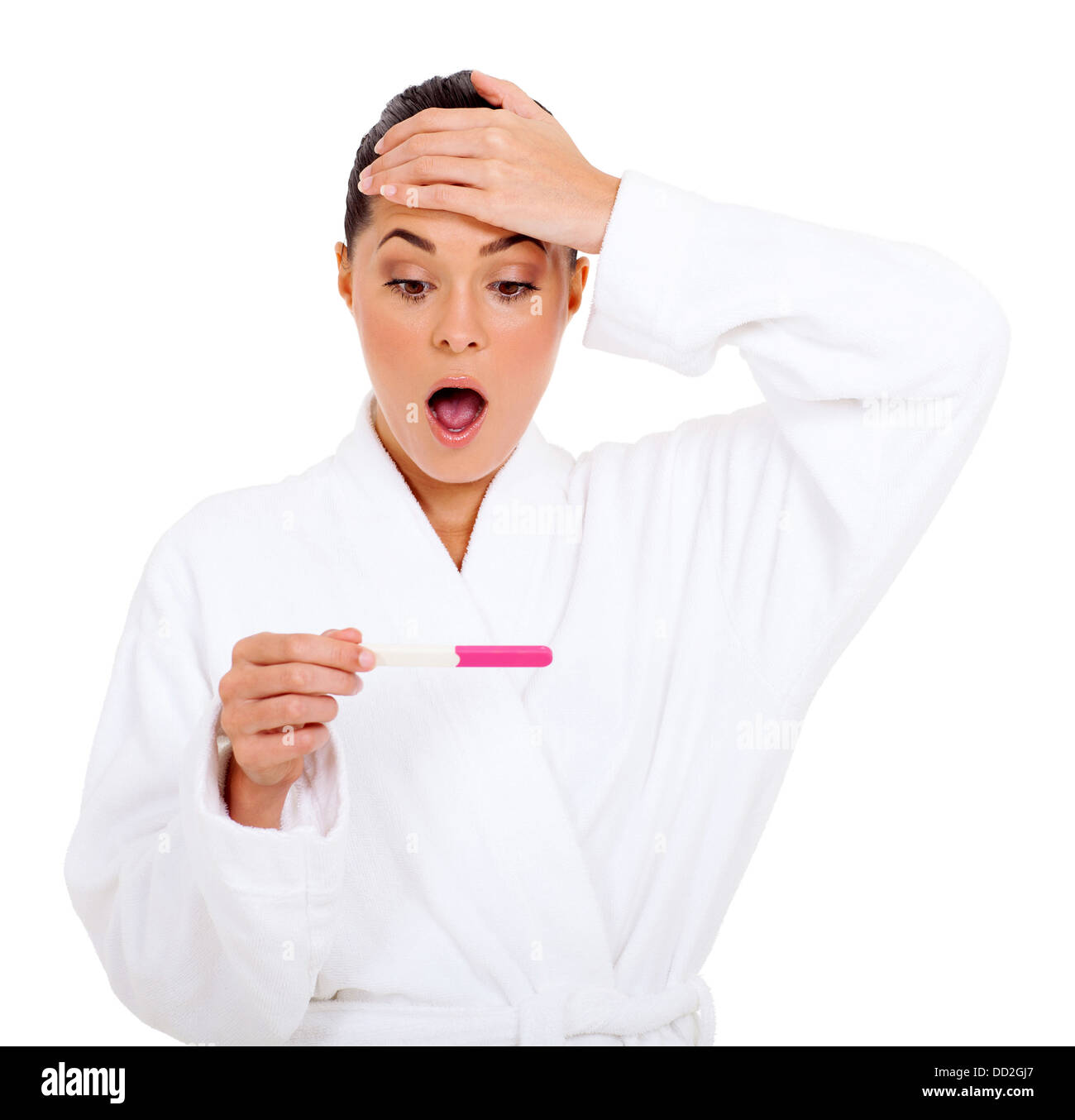 shocked woman in bathrobe with pregnancy test result Stock Photo Alamy