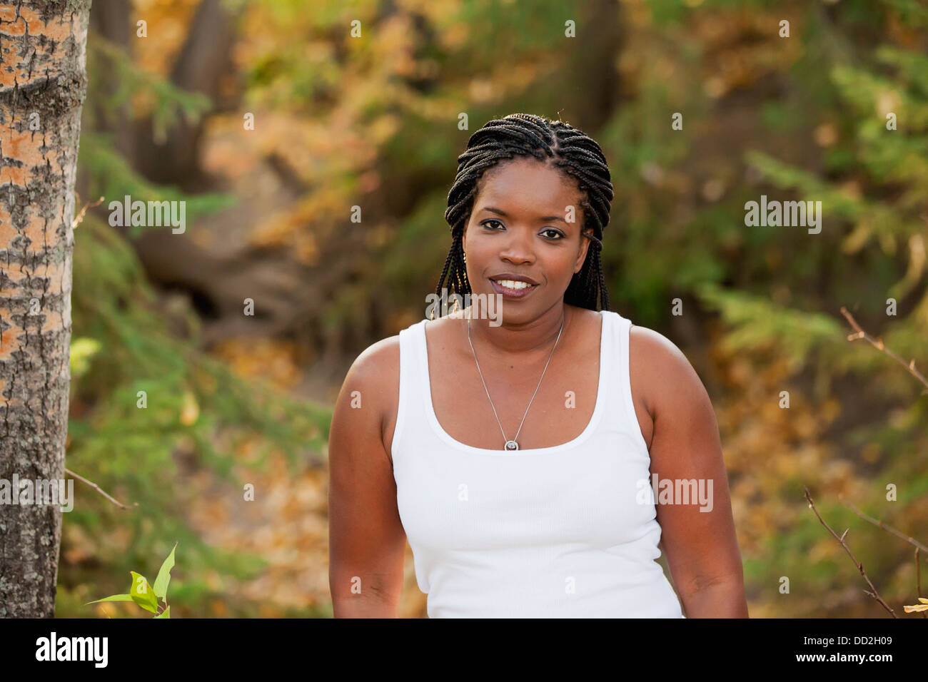 Portrait Of A Woman In A Park; Edmonton, Alberta, Canada Stock Photo Alamy