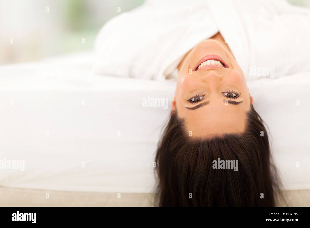 Young woman lying bed hi-res stock photography and images - Alamy