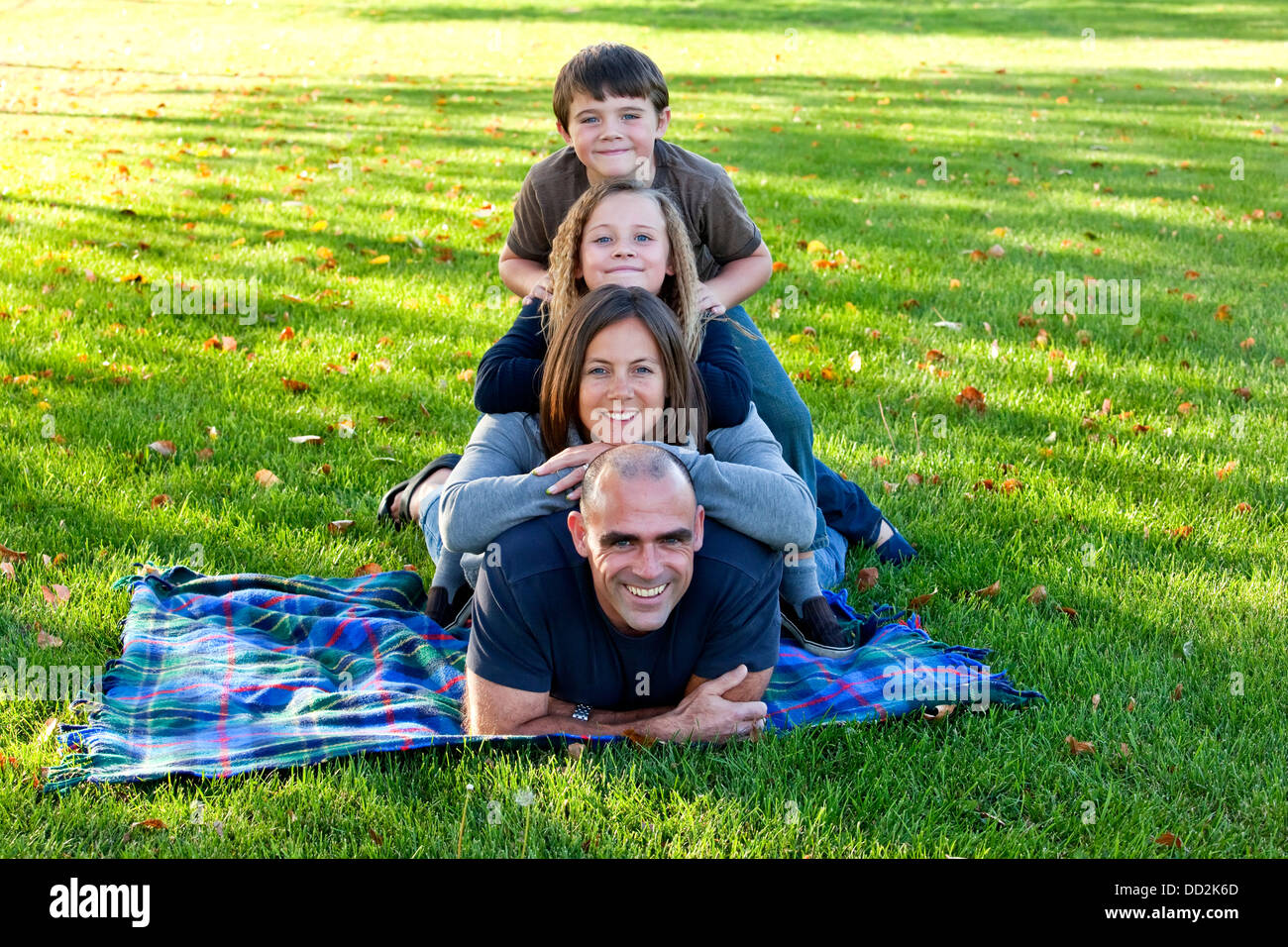 Family Totem Pole In The Park; Beaumont, Alberta, Canada Stock Photo ...