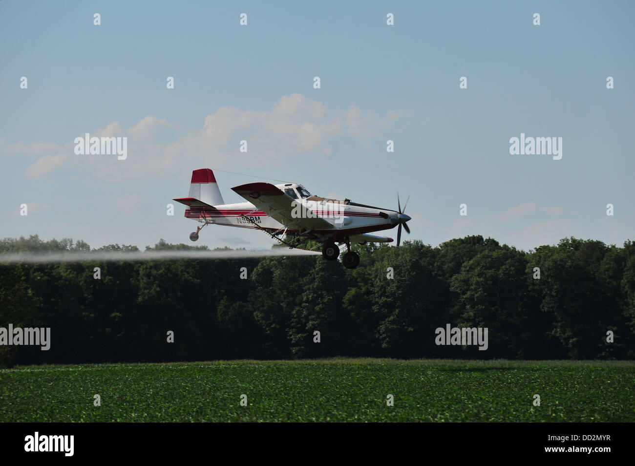 Cropduster spraying soybeans in the summer in rural Indiana, USA Stock Photo