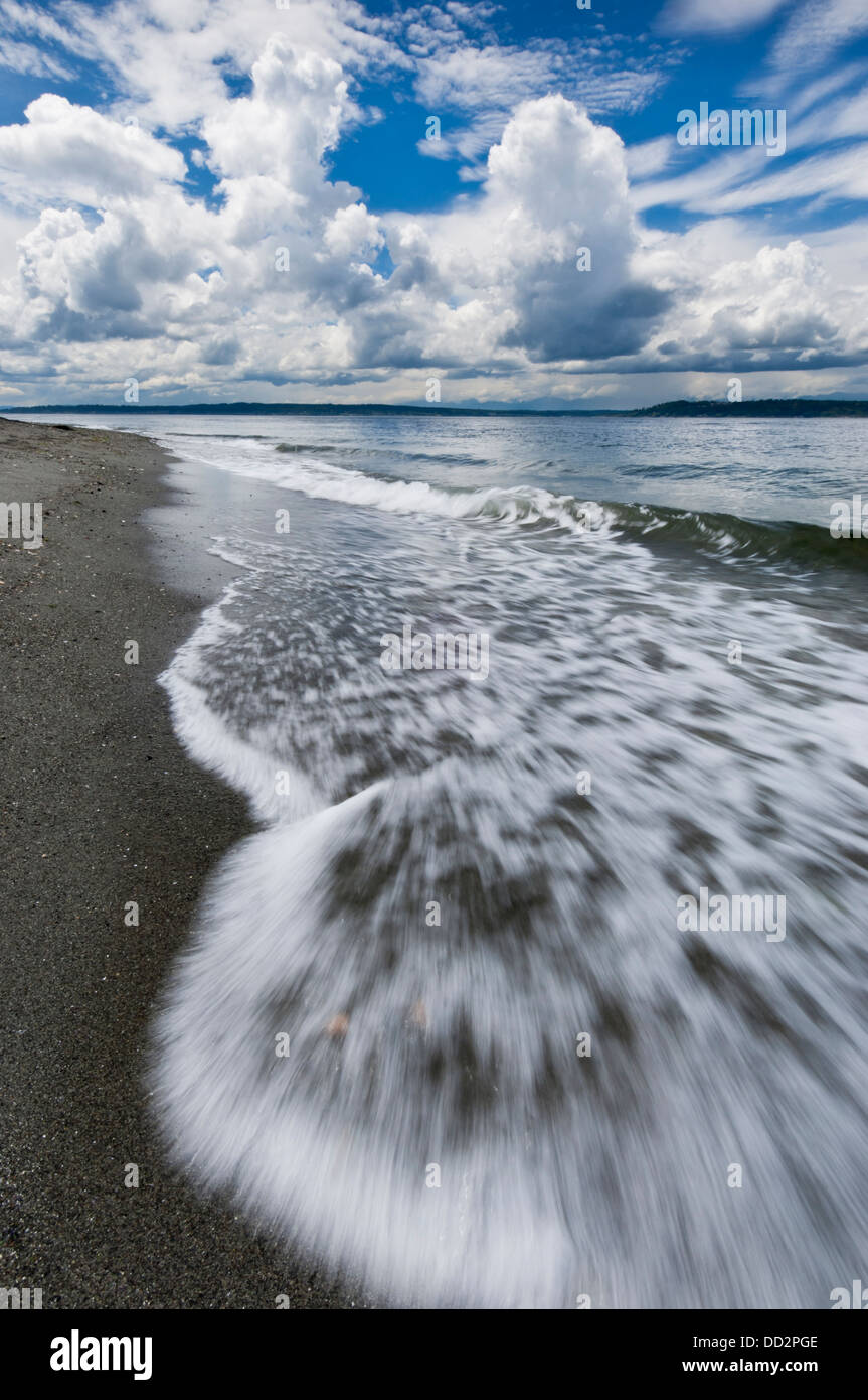 Waves wash up on the beach at Marina Beach Park, Edmonds, Washington, USA Stock Photo