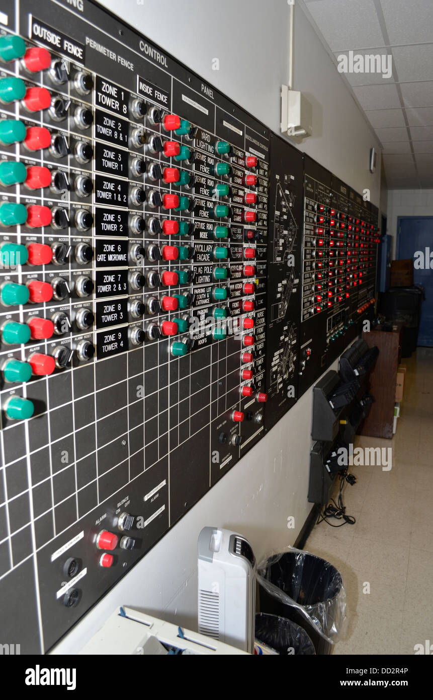Control panel with electric switches in an American medium security prison. The officer can open and lock doors from here. Stock Photo
