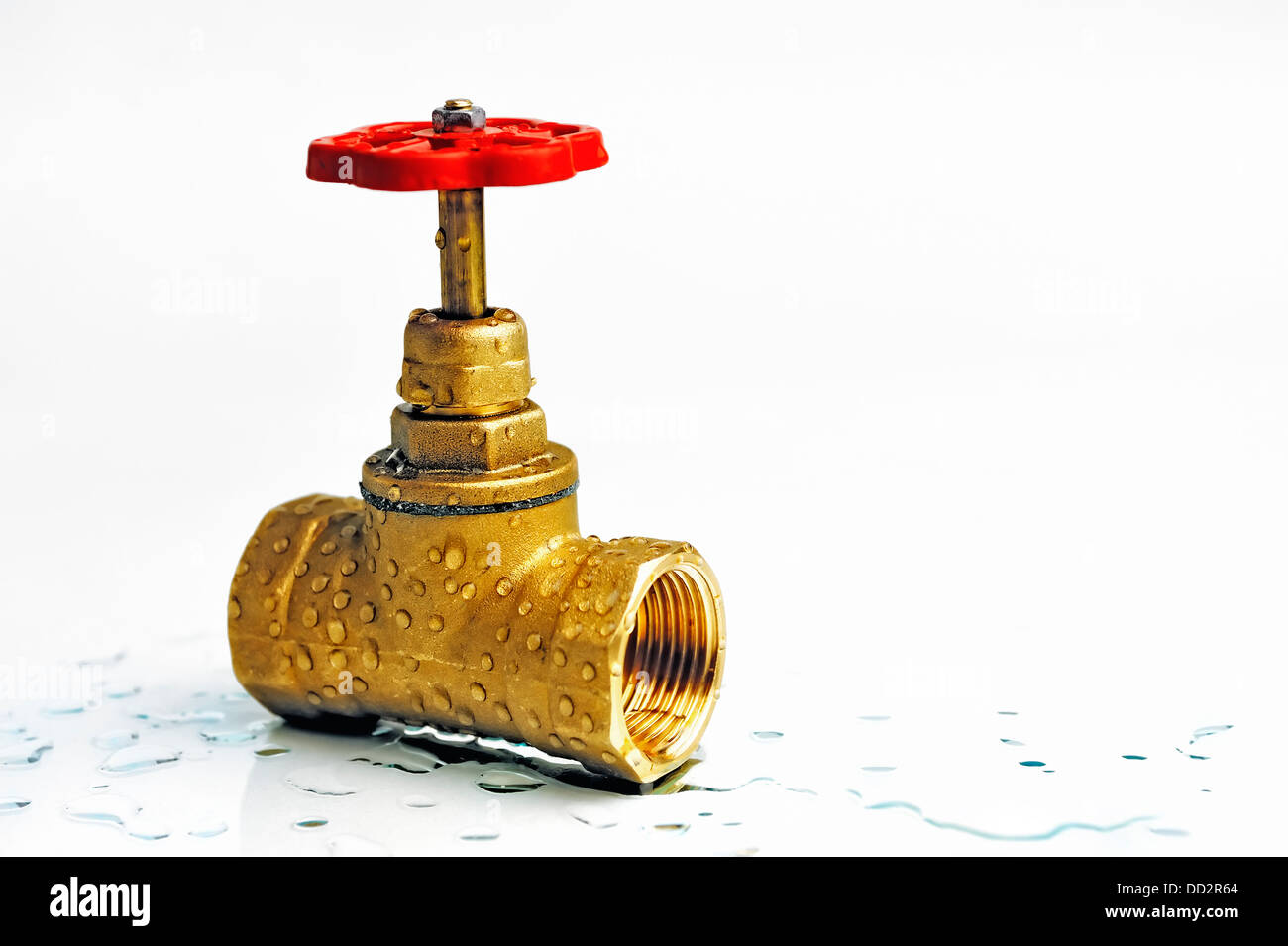 Shutoff valve with the red wheel Stock Photo Alamy