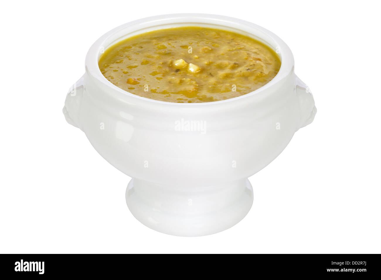 Pea Soup Cut Out - a bowl of thick, hearty pea soup, in a lion head bowl, front to back focus, isolated on white, clipping path. Stock Photo