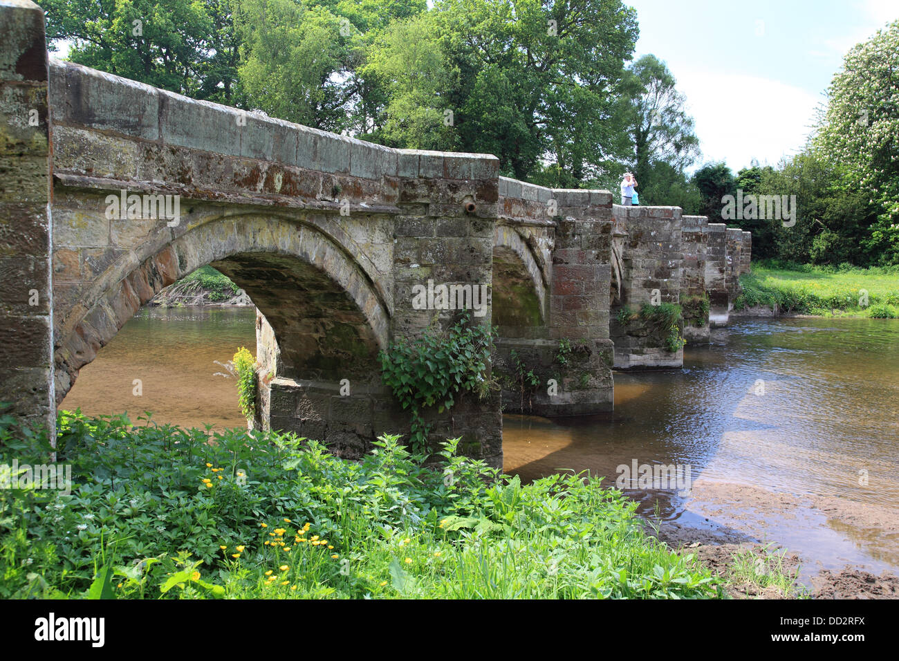 Essex Bridge, a packhorse bridge over the river Trent connecting the grounds of the Shugborough estate with Great Haywood Stock Photo