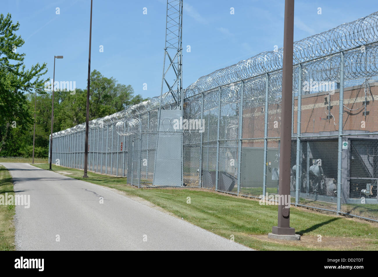 Perimeter fence at maximum security prison for juveniles in Omaha Nebraska. Stock Photo